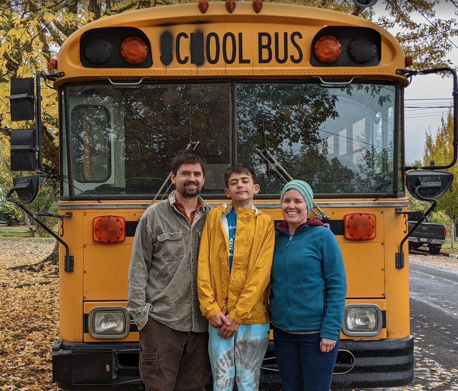 Jeremy, Jace, and Laura in front of their cool bus, a 